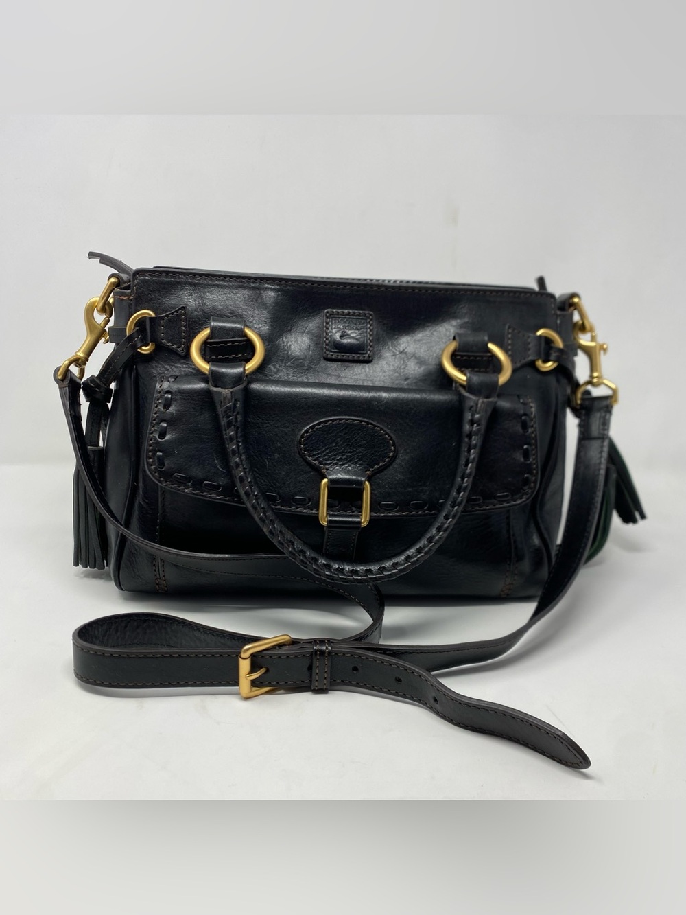 Dooney & Bourke Black Leather Satchel Handbag Red Lining Brass Tassel Strap